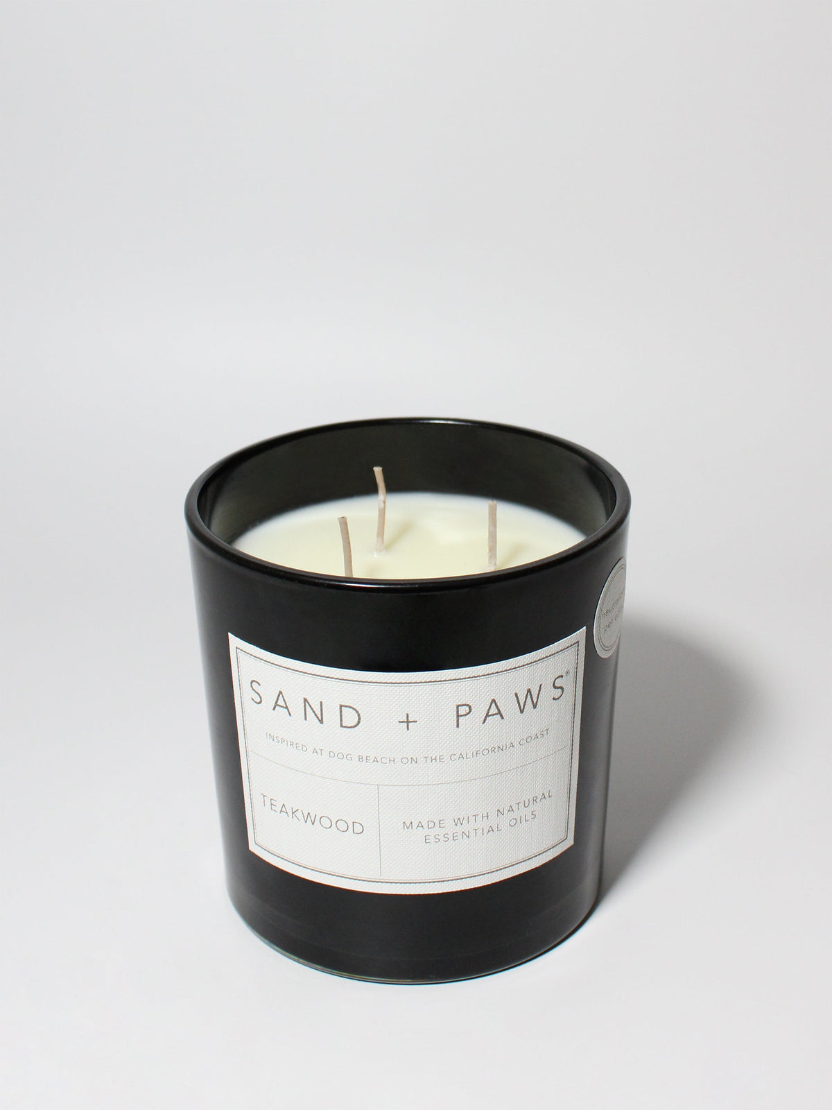 Sand + Paws Teakwood Cozy 21 oz scented candle